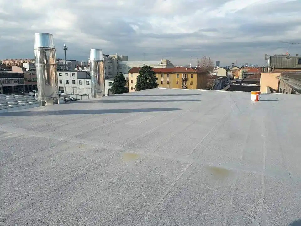 Flat roof with metal vents.