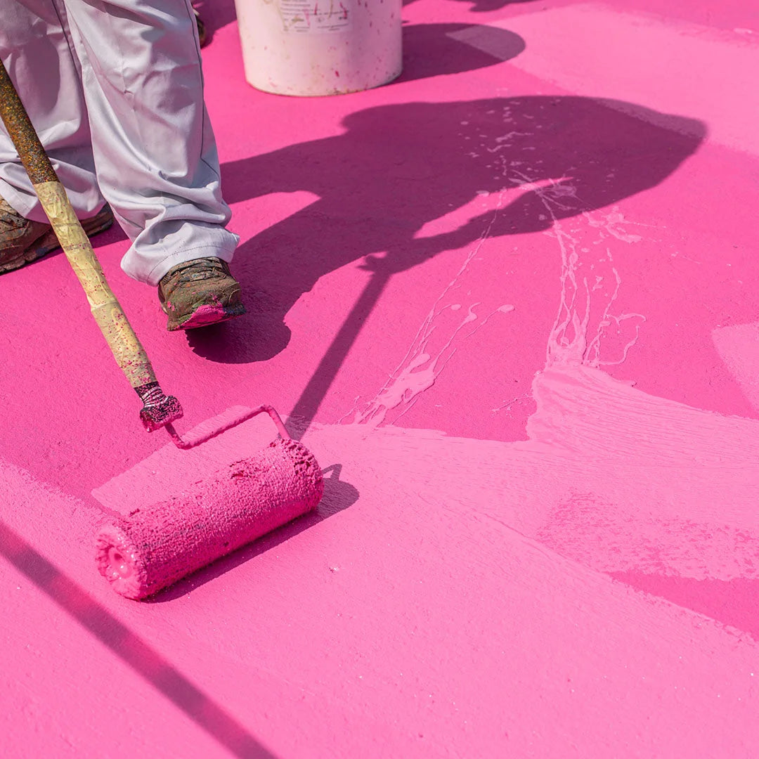 MAPECOAT TNS EXTREME applied on a concrete driveway for vehicle use, showing high-traction textured finish in a customized color