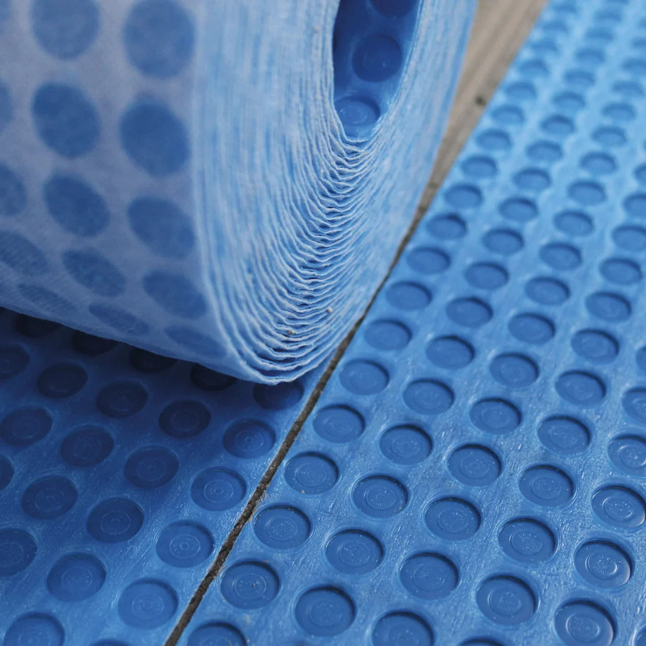 Mapeguard UM 35 waterproofing and anti-fracture uncoupling membrane roll for ceramic and stone tile installations.