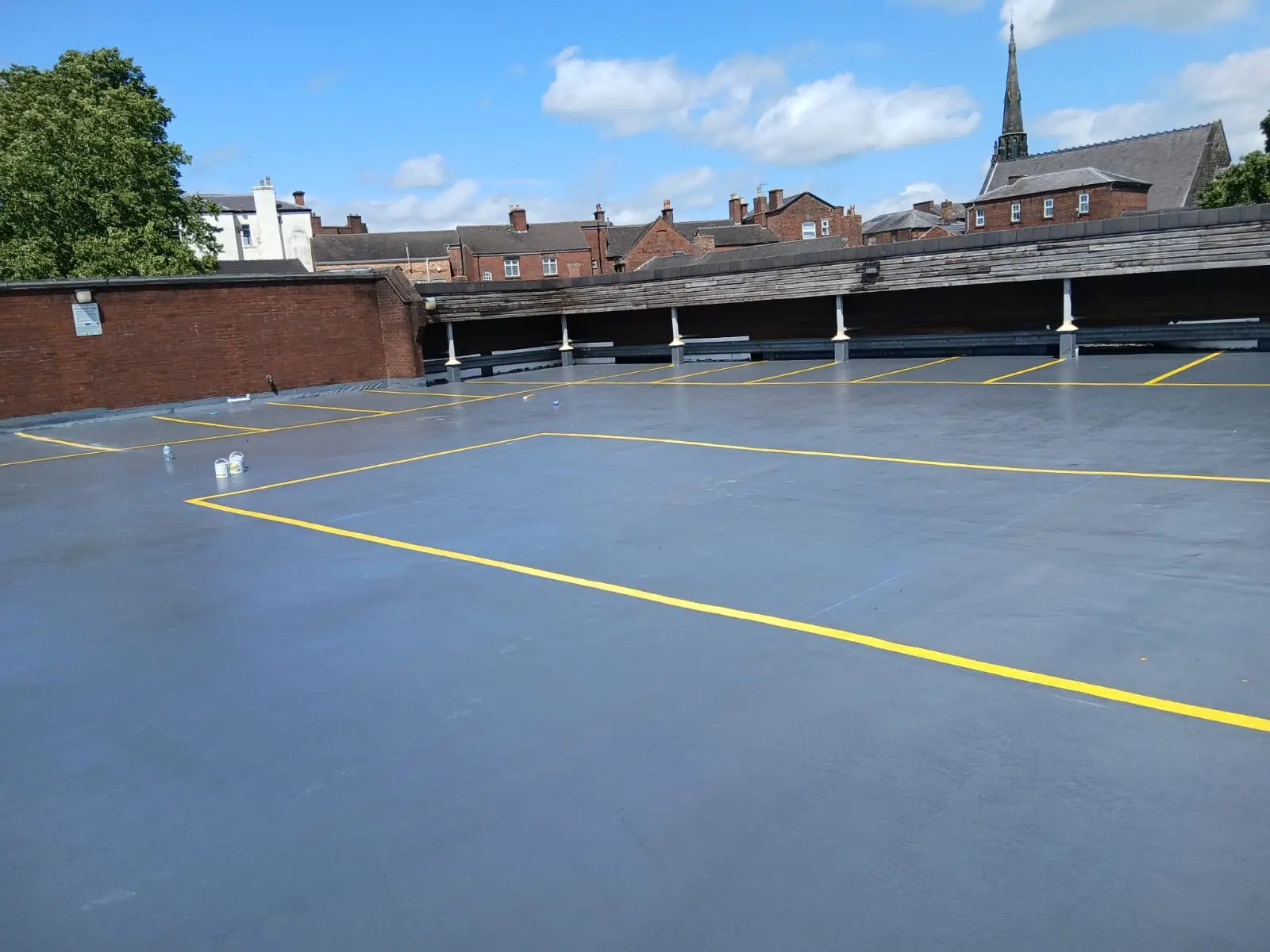 Completed car park deck refurbished using Tecnopol liquid coatings supplied by Clever Shield, featuring a slip-resistant, waterproof finish.