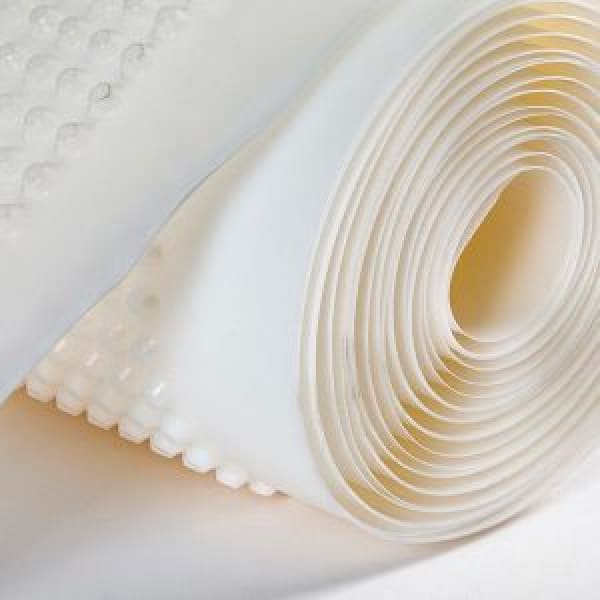 Roll of white, textured material for Clever Shield CM8 Cavity Drain Membrane usage