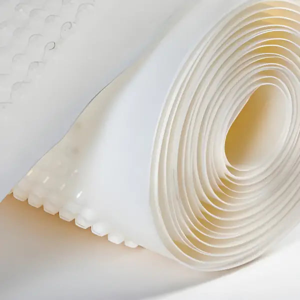 Roll of white, textured material for Clever Shield CM8 Cavity Drain Membrane usage