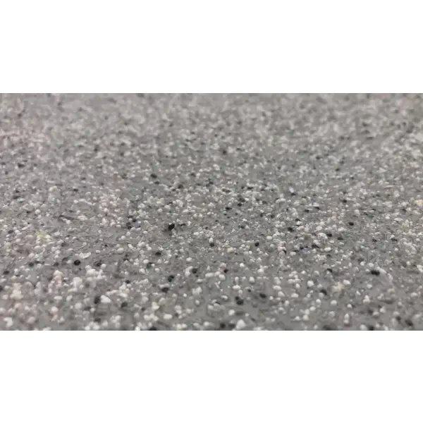 Rough concrete surface featuring visible aggregate particles in EleDeck Polyaspartic