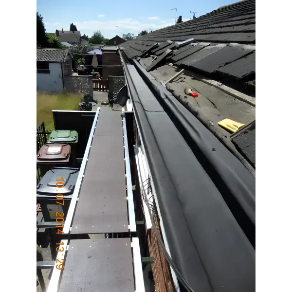 Roofing repair scaffolding used with the EPDM Gutter Lining Kit for efficient installation