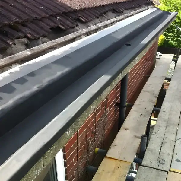 Dark gray gutter system featured in EPDM Gutter Lining Kit for durable waterproofing