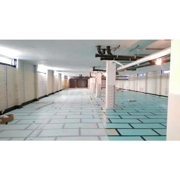 Raised access floor system featuring teal and white tiles in CDM Fibran XPS-500C