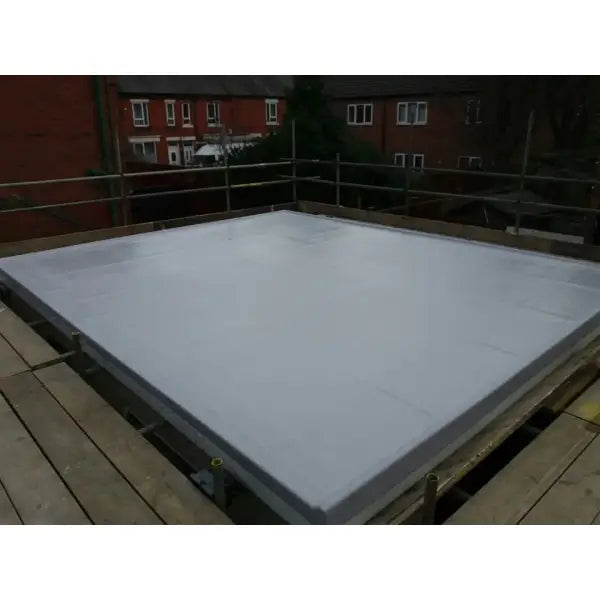 Flat gray roof with Flexitec 2020 Metal Primer showcasing ideal surface preparation