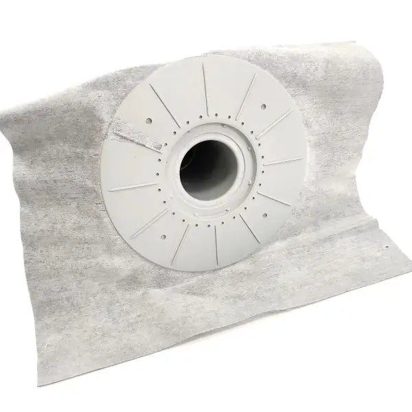 White circular washing machine agitator with fins on GRP Roof Vent 75mm fabric