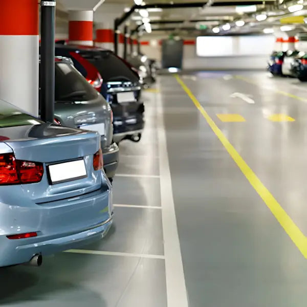 Cars parked in a row on QuickDeck Car Park Decking System parking spaces