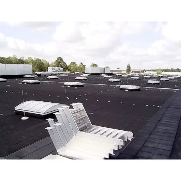 Flat roof featuring skylights using RESITRIX SK Partial Bond roofing system