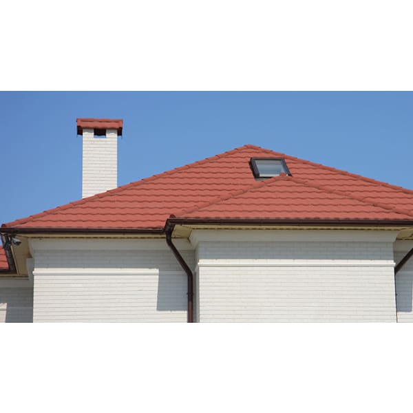 Red-tiled roof with chimney and skylight featuring SIRAMIGUARD ROOF SEAL