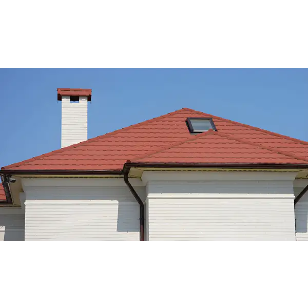 Red-tiled roof with chimney and skylight featuring SIRAMIGUARD ROOF SEAL for protection