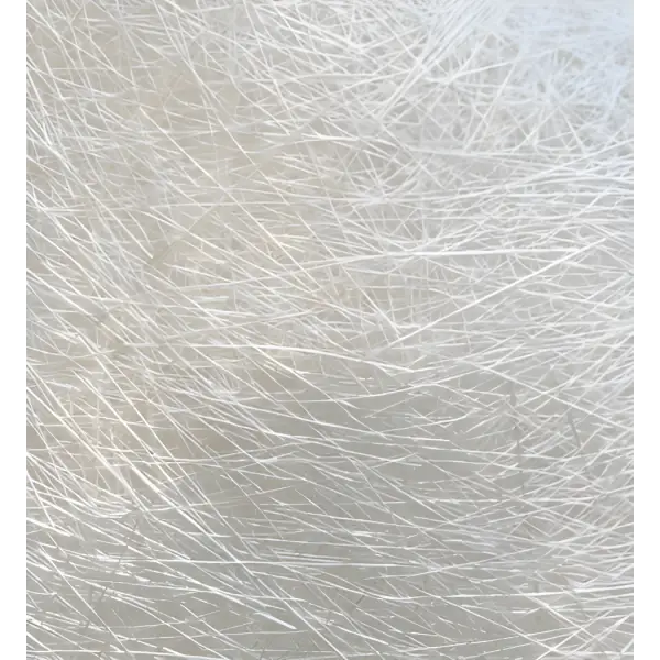 Tangled white fiberglass strands in a random pattern for Tecnoband and Tecnomesh Matting