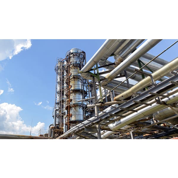 Industrial refinery complex featuring Thermaguard CUI 300 for corrosion under insulation