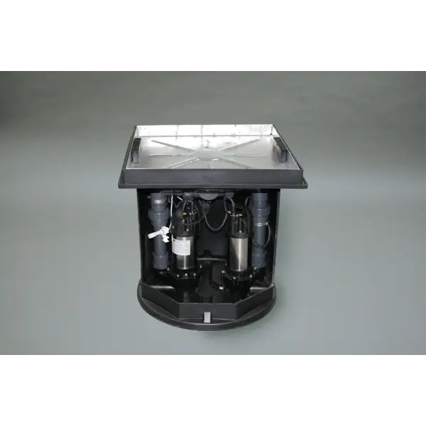 Sump pump system with metal lid and components in black basin by Titan Packaged Pump Systems