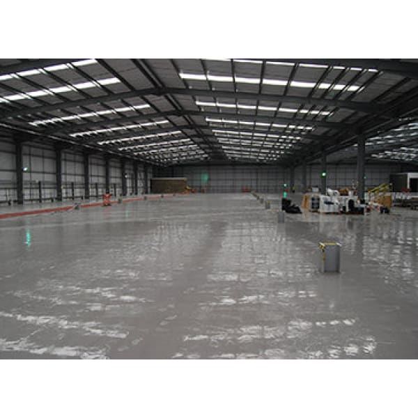 Vast, empty warehouse interior showcasing Triton Triseal’s spacious design