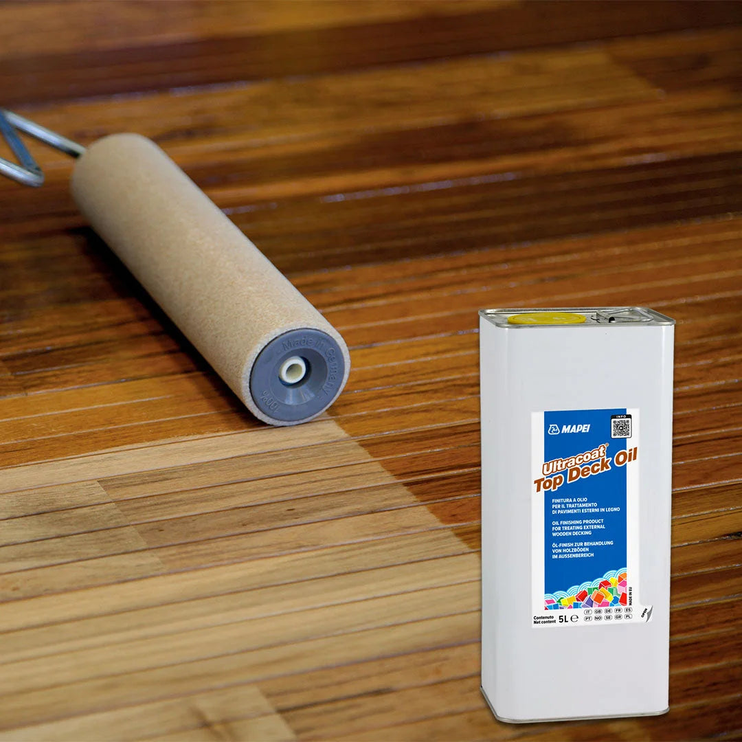 Ultracoat Top Deck Oil being applied to outdoor wooden decking with a roller – UV and mould protection for external timber surfaces