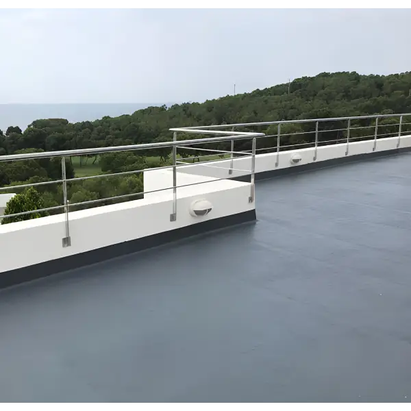 Flat rooftop featuring metal safety railings and Ultraflex Liquid Waterproofing membrane