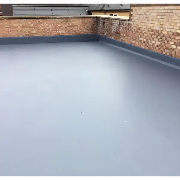 Flat gray roofing surface featuring Ultraflex Liquid Waterproofing membrane coating