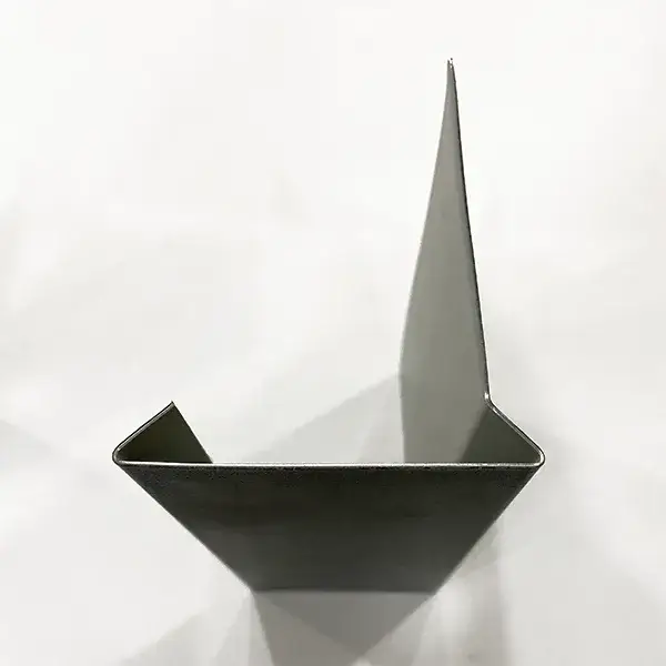 Simple origami paper boat with a tall sail featured in Ultraflex Trims product