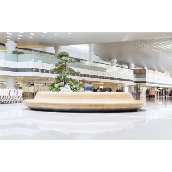 Circular planter featuring a bonsai tree on raised platform with VIP QuickFloor Flooring System