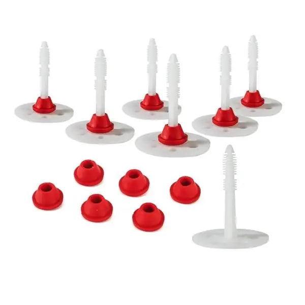 White plastic pegs with red rubber bases arranged for Wykamol CM Plaster Plugs